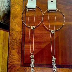 Two sets of costume jewelry, gold tone choker with pendant, crystals dangling.